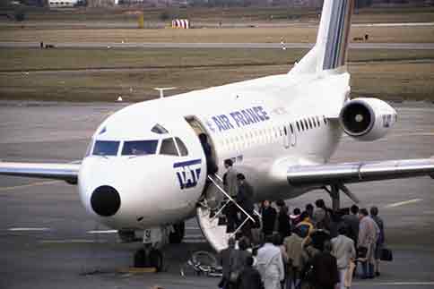 people boarding airplane in frace