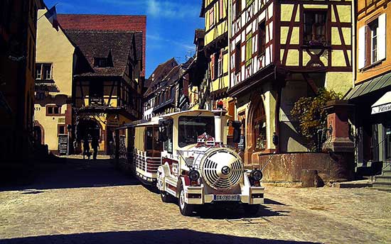 the tourist train in the Alsace village of Riquewihr in France